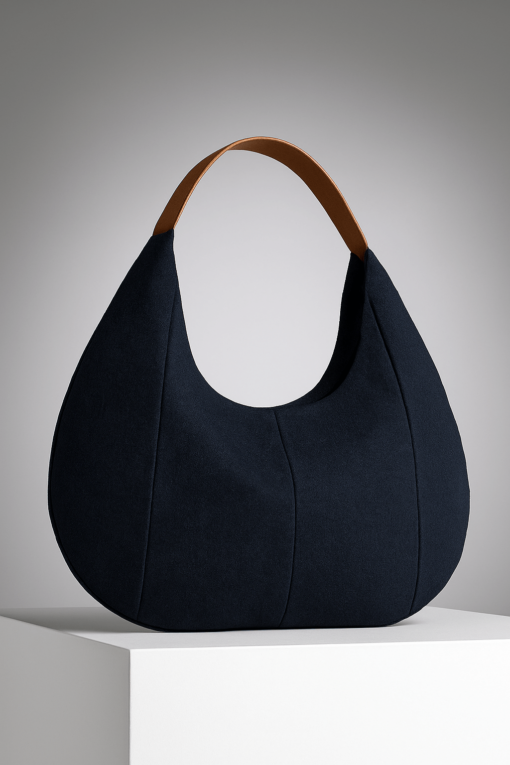 Sac a main rond bleu marine avec hanse marron